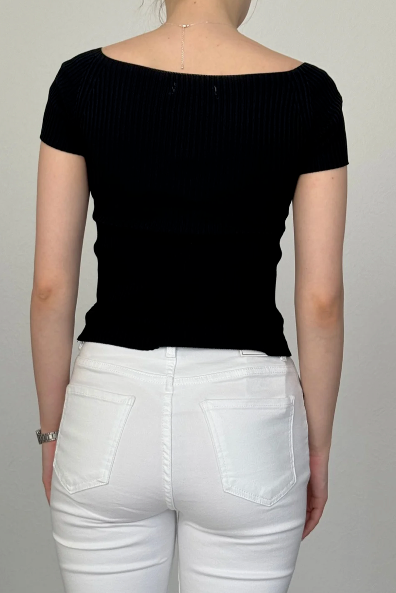 Melns tops