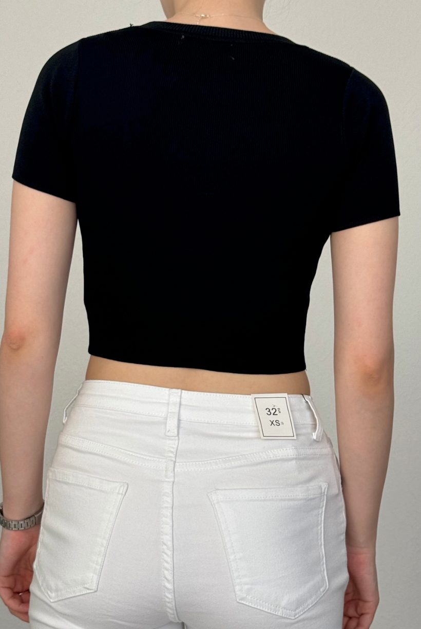 Melns tops